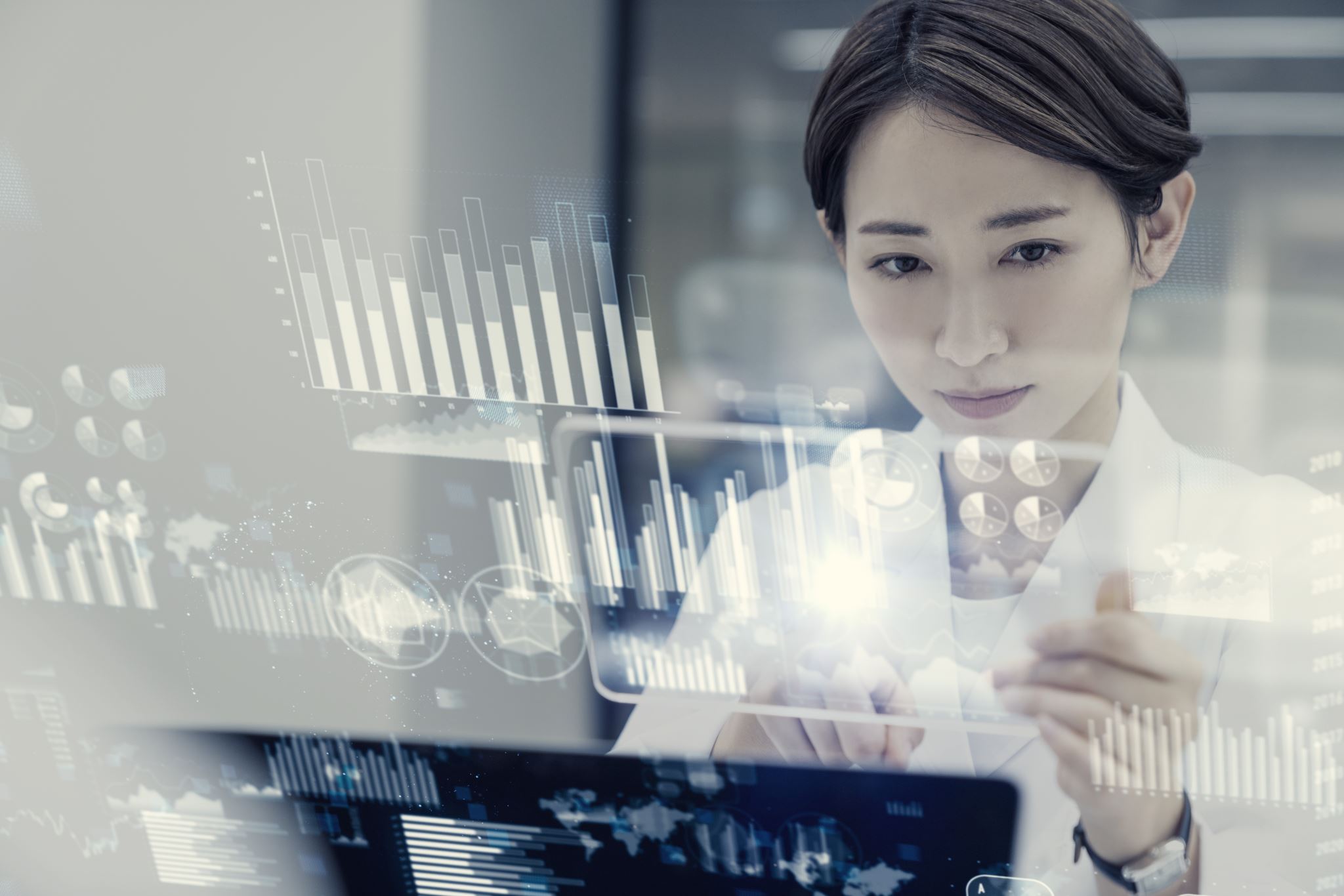 Scientist looking looking at a futuristic display with data